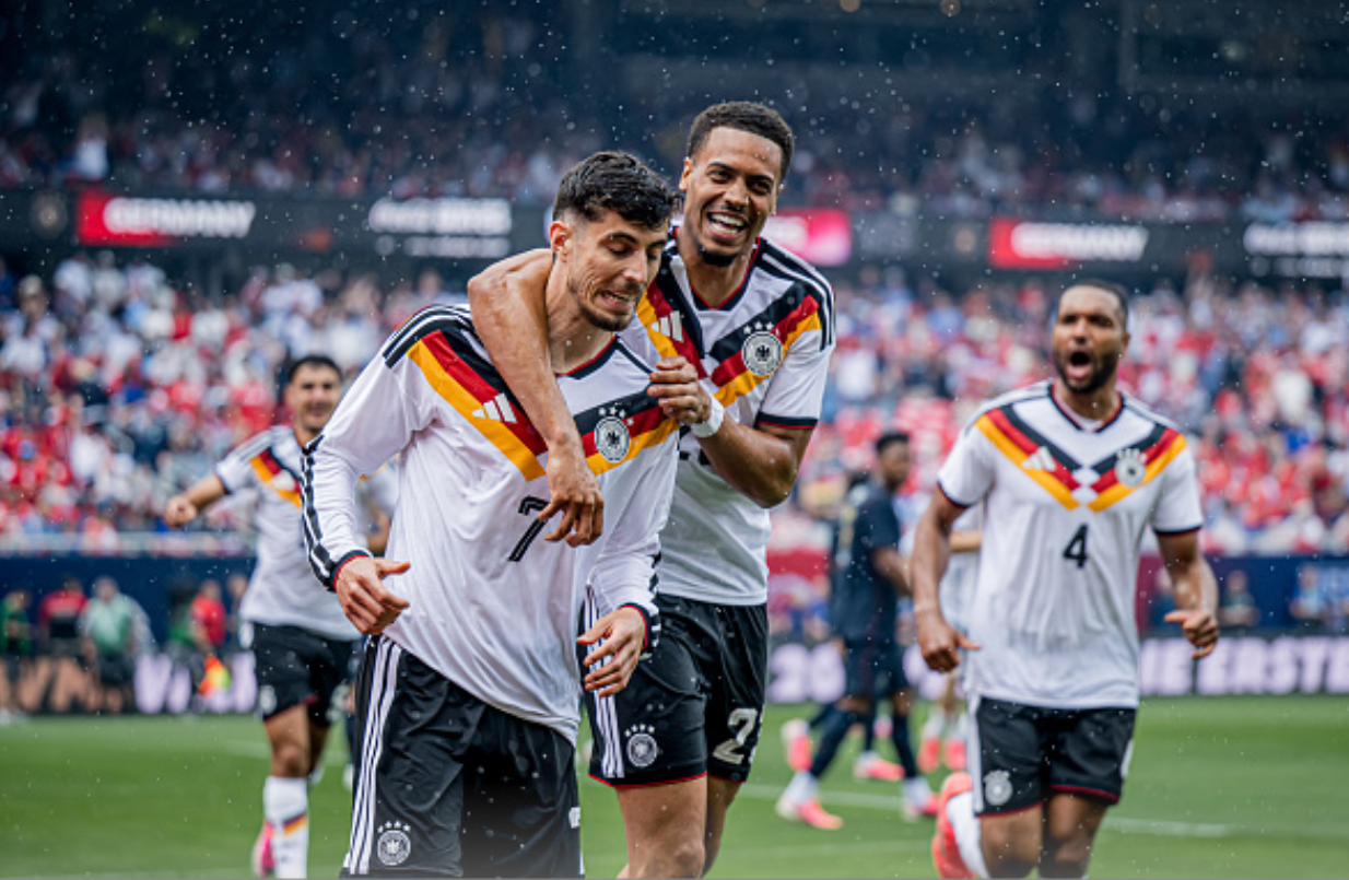 CHICAGO, ILLINOIS - JUNE 06: Kai Havertz of Germany celebrates after scoring his team's first goal with Jonathan Tah and Felix Nmecha during the international friendly match between United States and Germany at Soldier Field on June 06, 2026 in Chicago, Illinois. (Photo by Marvin Ibo Guengoer - GES Sportfoto/Getty Images)