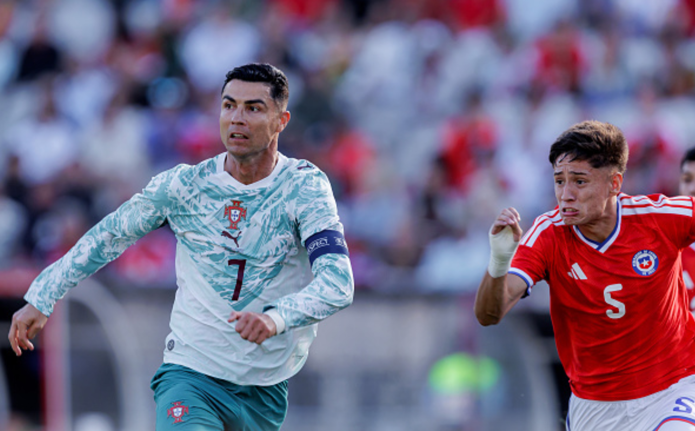 LISBON, PORTUGAL - JUNE 6: (L-R) Cristiano Ronaldo of Portugal, Ivan Roman of Chile during the International Friendly match between Portugal v Chile at the Estádio Nacional do Jamor on June 6, 2026 in Lisbon Portugal (Photo by Eric Verhoeven/Soccrates/Getty Images)