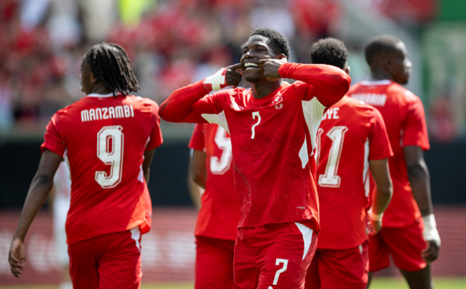 Switzerland's forward #7 Breel Embolo (C) celebrates scoring his team's first goal during a friendly football match between Switzerland and Jordan ahead of the 2026 FIFA World Cup football tournament at the Kybunpark stadium in St. Gallen on May 31, 2026. (Photo by Ennio LEANZA / AFP via Getty Images)