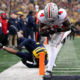 ANN ARBOR, MICHIGAN - NOVEMBER 29: Jeremiah Smith #4 of the Ohio State Buckeyes scores a touchdown against the Michigan Wolverines at Michigan Stadium on November 29, 2025 in Ann Arbor, Michigan. (Photo by Luke Hales/Getty Images)