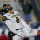 JACKSONVILLE, ALABAMA - DECEMBER 5: Marcus Patterson #6 of the Kennesaw State Owls celebrates after making a tackle for a loss against the Jacksonville State Gamecocks at AmFirst Stadium on December 5, 2025 in Jacksonville, Alabama. (Photo by Jason Clark/Getty Images)