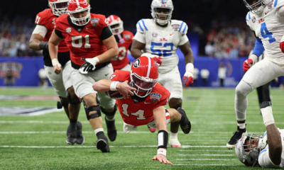 NEW ORLEANS, LOUISIANA - JANUARY 01: Gunner Stockton #14 of the Georgia Bulldogs dives for a touchdown during the second quarter against the Ole Miss Rebels during the 2025 College Football Playoff Quarterfinal at the Allstate Sugar Bowl at Caesars Superdome on January 01, 2026 in New Orleans, Louisiana. (Photo by Jamie Squire/Getty Images)