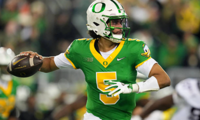 EUGENE, OREGON - NOVEMBER 14: Dante Moore #5 of the Oregon Ducks looks to throw during the first half against the Minnesota Golden Gophers at Autzen Stadium on November 14, 2025 in Eugene, Oregon. (Photo by Soobum Im/Getty Images)