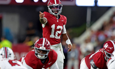 TUSCALOOSA, ALABAMA - SEPTEMBER 26: Keelon Russell #12 of the Alabama Crimson Tide makes an adjustment prior to the snap during the first quarter against the South Carolina Gamecocks at Bryant-Denny Stadium on September 26, 2026 in Tuscaloosa, Alabama. (Photo by Jason Clark/Getty Images)